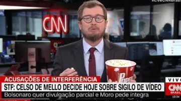 Leandro Narloch ilustrou a empolgação ao comer pipoca ao vivo - CNN
